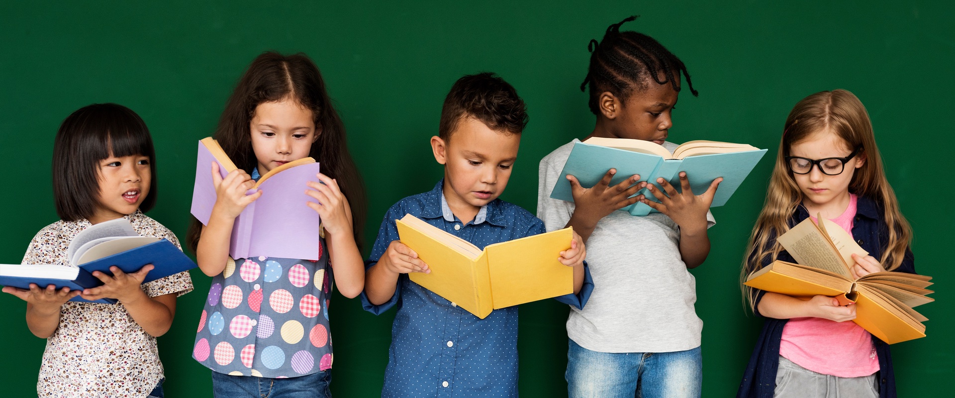Group of school kids reading for education